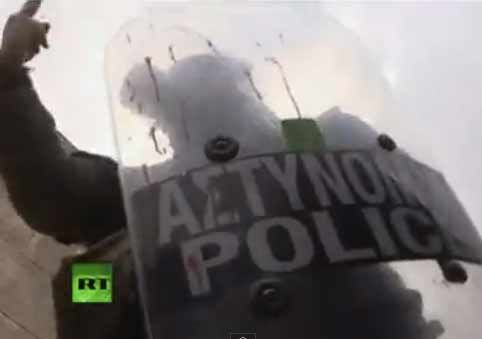 Greek police fire tear gas at protesters in latest clashes